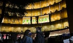 A small crowd stands outside the occupied Branford Price Millar Library at Portland State University, April 30, 2024. Demonstrators protesting the war in Gaza had occupied the library since Monday evening.