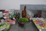 A cooking and food station at Tropishack in Guayama, Puerto Rico.