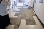 In July, tiles are missing on the first floor at Franklin High School.