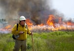 Joe Winckler volunteers as an instructor during a prescribed burn at the Wanaket Wildlife Area outside Hermiston, Ore., in May, part of a training with the Nature Conservancy and the Confederated Tribes of the Umatilla Indian Reservation.