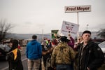 Ross Eliot, a leftist activist and proponent for armed self-defense, looks behind the Women’s March for any possible threats on Jan. 19, 2019 in The Dalles, Ore.