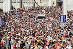 Participants in the Pride march cross the Elisabeth Bridge in Budapest, Hungary, on Saturday.