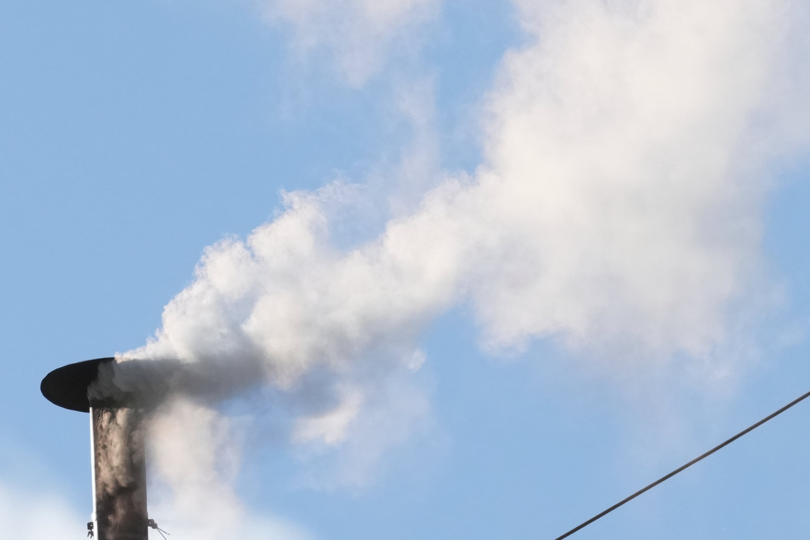 White smoke billows from the chimney of the Sistine Chapel during the conclave to elect a new pope, at the Vatican, Thursday, May 8, 2025.