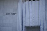 The scaffolding and tarp covering the facade of the Kennedy Center in Washington, D.C. on Aug. 13. The tarp remains one of the questions at the center of a federal lawsuit.