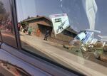 The view of a police cruiser's front seat at Pilot Butte Neighborhood Park in Bend on October 3, 2021, when violence broke out between clashing political demonstrations.