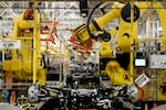 An assembly line utilizing automated machinery for assembling the Ford F-150 Lightning at the Ford Rouge Electric Vehicle Center in Dearborn, Mich., on Sept. 7, 2022.