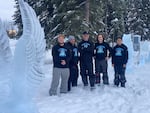 Chris Foltz, center, took four students from the ice sculpting course he teaches at the Oregon Coast Culinary Institute to the 2022 World Ice Art Championships in Alaska, including Nick Graham, who also competed alongside Foltz at an event at the competition.