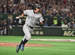 Seattle Mariners Ichiro Suzuki runs to first base in a game against the Oakland Athletics during their baseball game at the Major League Baseball Japan Opening Series in Tokyo, on March 20, 2019.