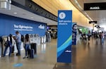 Departing passengers at Sea-Tac International Airport have lots of check-in kiosks to choose from with air traffic still way down from last year.