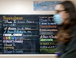 Patients fill in their answers to the prompt, “I dream to someday…” in a hallway at the Oregon State Hospital in Salem, March 8, 2023.