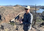 Klamath River Renewal Corporation CEO Mark Bransom stands above Iron Gate Dam in July 2023.