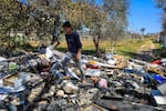 Palestinians inspect the debris of the houses destroyed by Israeli bombardment in Rafah in the southern Gaza Strip on March 11.