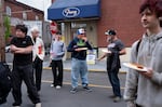 People stand outside of Franz Premium Bread during a block party on April 14, 2026 in Portland, Ore. The bakery, which is one of the largest family-owned bakeries on the West Coast, held the party to celebrate 120 years.