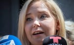 Virginia Giuffre speaks during a news conference outside a Manhattan court in New York, Aug. 27, 2019.