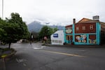 A man walks through downtown Stevenson, Wash., Thursday, May 14, 2020. Skamania County was one of the first counties in Washington to partially reopen amid the COVID-19 pandemic.