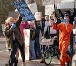 Students protest outside St. Helens High School in St. Helens, Ore., on Nov. 15, 2024. Two teachers were arrested for allegedly sexually assaulting students, leading to outrage among the student body.