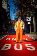 Vincent Edmonson stands for a portrait on the newly painted transit lane that is part of PBOT's effort to make bus, streetcar, and train service better.