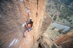 Jess Moran is a climber and one of the athletes featured in the "Oregon Outdoor Athlete Project" photo series created by adventure photographer Ben Kitching. Moran is shown here climbing the route known as "Vomit Launch" at Smith Rock State Park in Central Oregon on April 11, 2024.