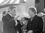 Vice President Walter Mondale speaks with President Jimmy Carter at Minneapolis-St. Paul International Airport in St. Paul, Minn., on Jan. 16, 1978.