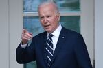 President Biden walks to the Oval Office from the Rose Garden on May 14.