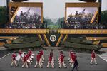 Members of the U.S Army parade down Constitution Avenue, representing the Revolutionary War era.