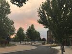 Smoke from the Milli fire threatening Sisters, as seen from Bend.