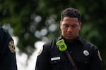 Portland firefighter Jordan Brown closes his eyes as Portland Fire Fighters Pipes and Drums perform “Amazing Grace.” As the bagpipes rang, he thought of the recent funeral services he attended for first responders who died in the line of duty, as well as his late mother, an Irish woman who loved the bagpipes.