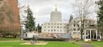 FILE: The construction staging area can be seen outside the Oregon Capitol in Salem in December 2021.