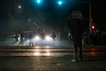 On the 100th consecutive night of mass protests against systemic racism and police brutality in Portland, protesters gathered in East Portland and clashed with police for hours. Police, who arrested 59 people throughout the night, declared the gathering a riot after a demonstrator threw a Molotov cocktail at the police.