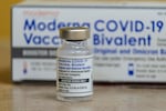 This photo shows a vial of the Moderna COVID-19 vaccine.