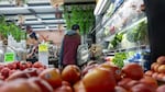 People shop for food in a Brooklyn neighborhood that has a large immigrant population on October 16, 2023 in New York City.