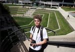 Student Kevin Haslem takes photos near the site where conservative commentator Charlie Kirk was killed on the campus of Utah Valley University in Orem, Utah, on Aug. 27, 2026.