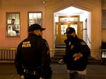 Eugene police stand outside WOW Hall, a performing arts venue in Eugene.