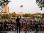 Thais protest against the government in February 2020 after Thailand's Constitutional Court ordered the dissolution of the Future Forward Party, finding the party guilty of violating election law by accepting a loan from its founder. Party supporters gathered despite concerns about COVID-19.