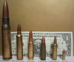 A .50-caliber round, as shown on the left, is the type of ammunition used in the machine gun in Emry's possession.