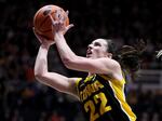 Caitlin Clark shoots the ball against the Purdue Boilermakers in January in West Lafayette, Indiana.