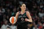 FILE - Portland Fire guard Carla Leite (0) dribbles down the court during the first half of a WNBA basketball game May 9, 2026, in Portland, Ore.