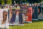 In this Aug. 31, 2020, file photo, some of the nearly 900 large poster-sized photos of Detroit victims of COVID-19 are displayed on Belle Isle in Detroit.
