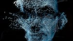 Futuristic animated image of the contours of a man's face, made up of blue and white dots on a black background