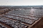 New German cars are stored at a logistic center in Essen, Germany, Monday, Feb. 3, 2025.