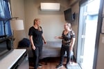 Chelsea Jones and Dawn Hemry, staffers with the organization Adapt Integrated Health Care, stand in a crisis resolution room at Roseburg's sobering center on Sept. 16, 2024. The crisis resolution rooms are offered to people in crisis to stay voluntarily.