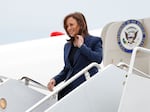 Vice President Harris descends from Air Force 2 in Milwaukee ahead of a campaign event on Tuesday.