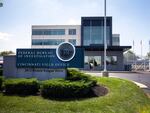 The entrance to the FBI headquarters in Cincinnati is shown on Thursday. An armed man decked out in body armor tried to breach a security screening area at the field office, then fled and exchanged gunfire in a standoff with law enforcement, authorities said.