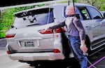 Still images from a reconstruction test show the shattering of an SUV taillight displayed during the Karen Read retrial in Norfolk Superior Court in June.