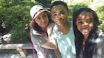 Foster parent Rene Denfeld poses for a selfie in Washington Park with two of her children, who she adopted from foster care.