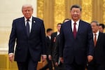 FILE - President Donald Trump, left, and Chinese President Xi Jinping arrive during a state dinner at the Great Hall of the People, May 14, 2026, in Beijing.