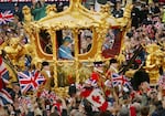 June 4, 2002: Queen Elizabeth II and Prince Philip ride in the Golden State Carriage at the head of a parade from Buckingham Palace to St. Paul's Cathedral to celebrate the Queen's Golden Jubilee along The Mall in London, England.