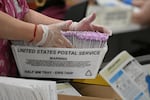 In this file photo, election workers prepare mail-in ballots for tallying at the Los Angeles County Ballot Processing Center on the eve of Election Day, November 4, 2024, in City of Industry, California.