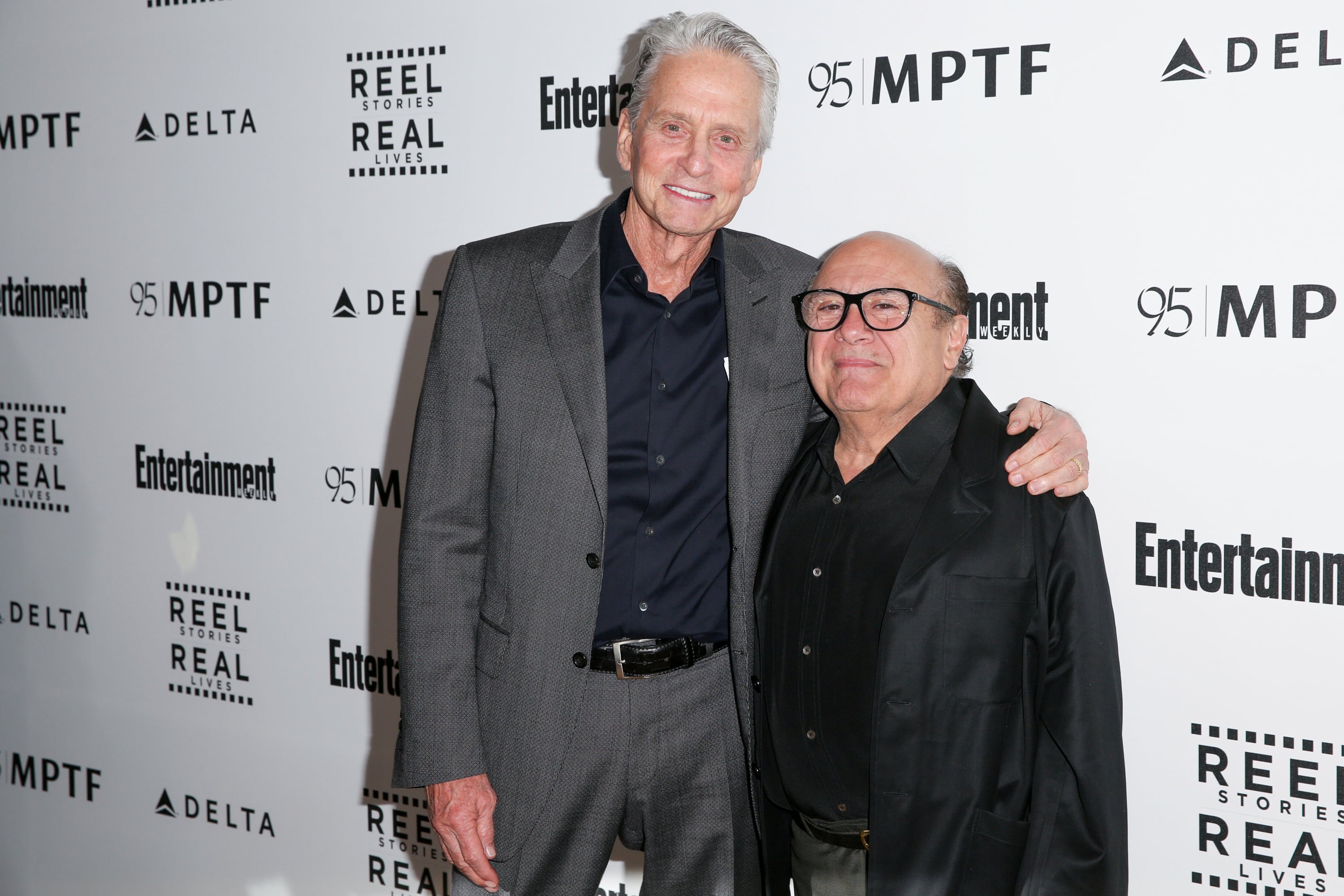FILE - Michael Douglas, left, and Danny DeVito appear at the 5th Annual Reel Stories, Real Lives Benefit on April 7, 2016, in Los Angeles.