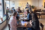 About 20 people ended up participating in a speed-friending event at Cafe Con Arte. This was the third such event the cafe has hosted.